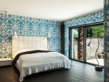 interior of a modern villa, beautiful bedroom, double bed